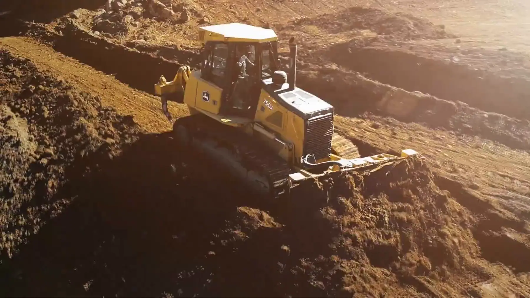 Aerial view of an LPG dozer cutting a slope